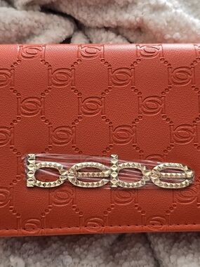 Bebe Sunset Coral Crossbody Wallet with Gold Chain Strap